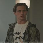 Robby’s racing car print tee and green print jacket on Cobra Kai