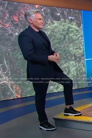 Sam Champion’s black sneakers on Good Morning America