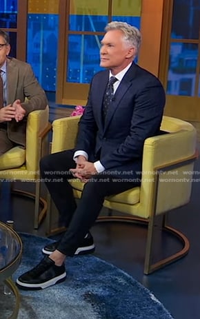 Sam Champion’s black sneakers on Good Morning America