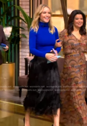 Sara’s blue turtleneck top and fringe skirt on The View