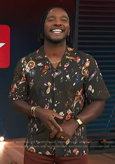 Scott’s black floral print shirt on Access Hollywood