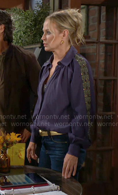 Sharon’s navy blouse with embellished sleeves on The Young and the Restless