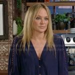 Sharon’s navy v-neck blouse with stud insets on The Young and the Restless