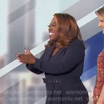 Sheryl’s navy asymmetric blazer on The Talk