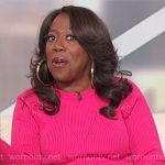 Sheryl’s pink lace-up sweater on The Talk