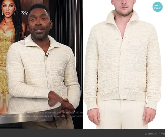 Justin’s white textured cardigan on E! News