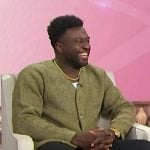 Sinqua’s green textured cardigan on Sherri