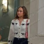 Sophia’s white heart cardigan and layered denim mini skirt on Days of our Lives