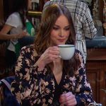 Stephanie’s black floral v-neck dress on Days of our Lives