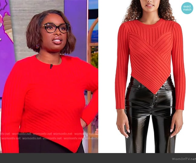 Jennifer’s red asymmetric sweater on The Jennifer Hudson Show