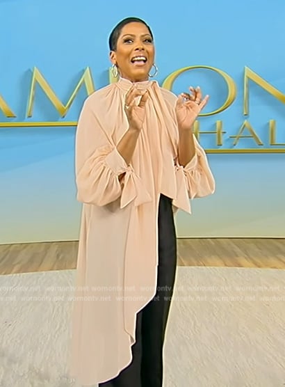 Tamron’s pink asymmetric top on Tamron Hall Show