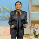 Tamron’s navy pinstripe tie neck blazer and pants on Tamron Hall Show