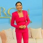 Tamron’s pink peplum blouse and pants on Tamron Hall Show