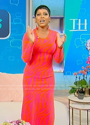 Tamron's pink red zebra print dress on Tamron Hall Show