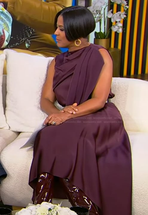 Tamron's burgundy drape satin top and skirt on Tamron Hall Show