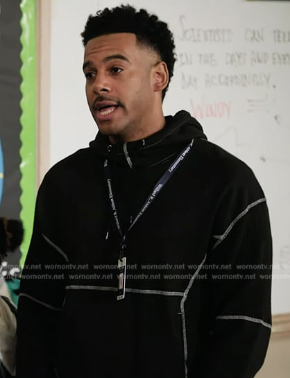 Tariq’s black contrast stitch jacket on Abbott Elementary