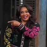 Vivica A. Fox’s black floral print cardigan on Access Hollywood