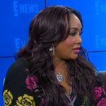 Vivica A. Fox’s black floral print cardigan on E! News