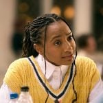 Whitney’s yellow sweater vest on The Sex Lives of College Girls