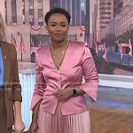 Zinhle’s pink satin jacket and pleated skirt on NBC News Daily