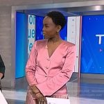 Zinhle’s pink satin jacket and pleated skirt on NBC News Daily