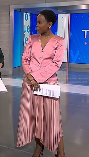 Zinhle's pink satin jacket and pleated skirt on NBC News Daily