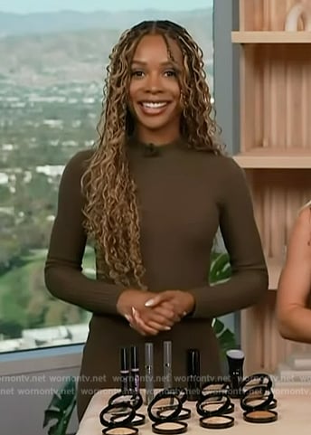 Zuri’s green ribbed long sleeve dress on Access Hollywood