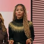 Zuri’s black argyle knit sweater and leather mini skirt on Access Hollywood