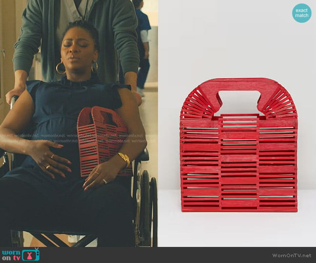 Asos bamboo Square Boxy Slutch bag in Red worn by Carla Owens (Teyonah Parris) on No Good Deed