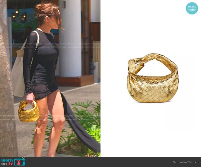 Meredith’s metallic knot bag on RHOSLC