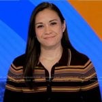 Christiane Cordero’s black striped polo top on Good Morning America