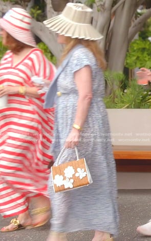 Kathy’s white floral straw bag on The Real Housewives of Beverly Hills