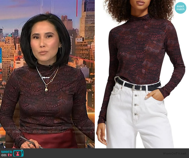 Scotch and Soda Feather Print Long Sleeve Mock Neck Top worn by Vicky Nguyen on NBC News Daily