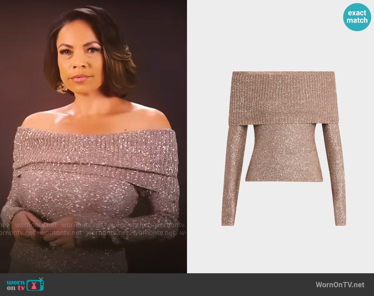 Nicole’s metallic off-shoulder sweater on Beyond the Gates