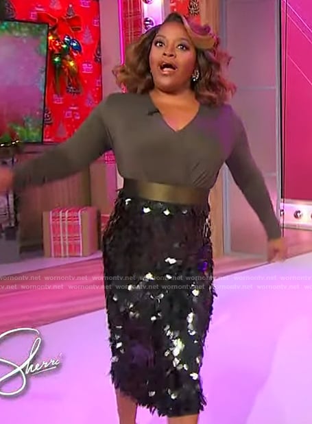 Sherri’s olive bodysuit and sequin skirt on Sherri