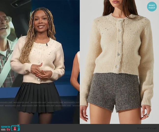 Zuri’s embellished beige cardigan on Access Hollywood