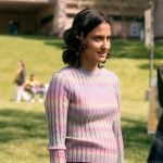 Bela’s pastel ombre sweater and purple corduroy skirt on The Sex Lives of College Girls