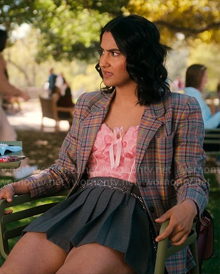 Bela's plaid blazer and pink floral bustier top on The Sex Lives of College Girls