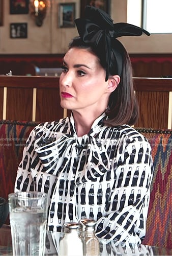 Bronwyn's Coca Cola print blouse and skirt on The Real Housewives of Salt Lake City