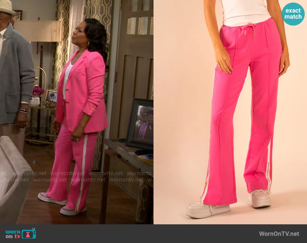 Care Tucker Jordan Interlock Pants in Pink worn by Tina Butler (Tichina Arnold) on The Neighborhood