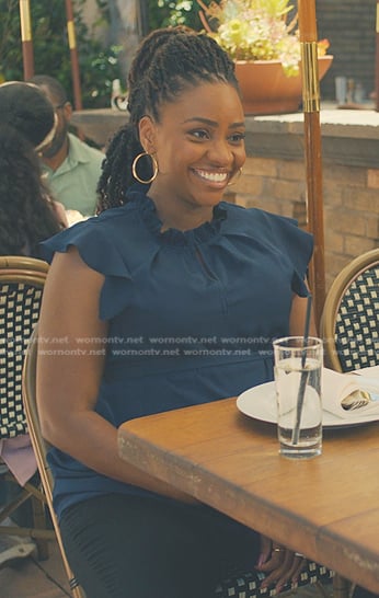 Carla's navy ruffle short sleeve top on No Good Deed