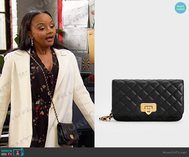 Charles & Keith Cressida Quilted Push-Lock Clutch in Black worn by Chanel Dupree (Raven Bowens) on Days of our Lives