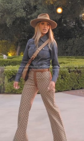 Dorit's denim shirt and brown monogram pants on The Real Housewives of Beverly Hills