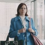 Elsbeth’s blue coat and zebra tote on Elsbeth