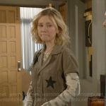 Lucy’s green star print jumpsuit on The Young and the Restless