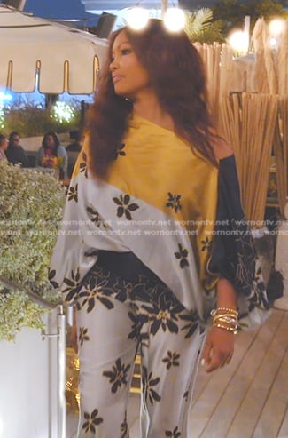 Garcelle's floral colorblock blouse and pants on The Real Housewives of Beverly Hills