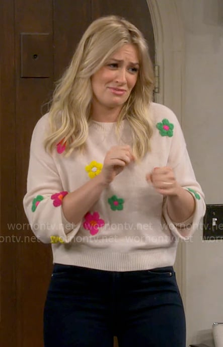 Gemma's colorful floral sweater on The Neighborhood