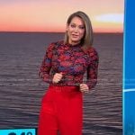 Ginger’s floral mock neck top and red pants on Good Morning America