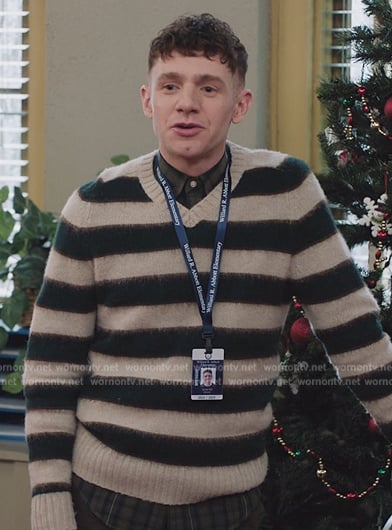 Jacob's striped v-neck sweater on Abbott Elementary