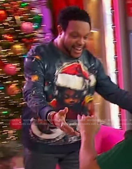 Jawn’s DJ Christmas sweater on Sherri